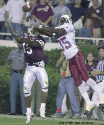 Mississippi State University split end, Terrel Grindle, and South Carolina defensive back, Andre Goodman, go up for what was to become an imcomplete pass in Thursday nights game. This marked the first Division 1A game since the terrorist attack.