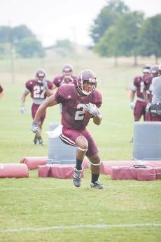 Robert Elliot, who will likely see significant time on the field in 2010 due to Anthony Dixons graduation, runs drills during football fall camp
