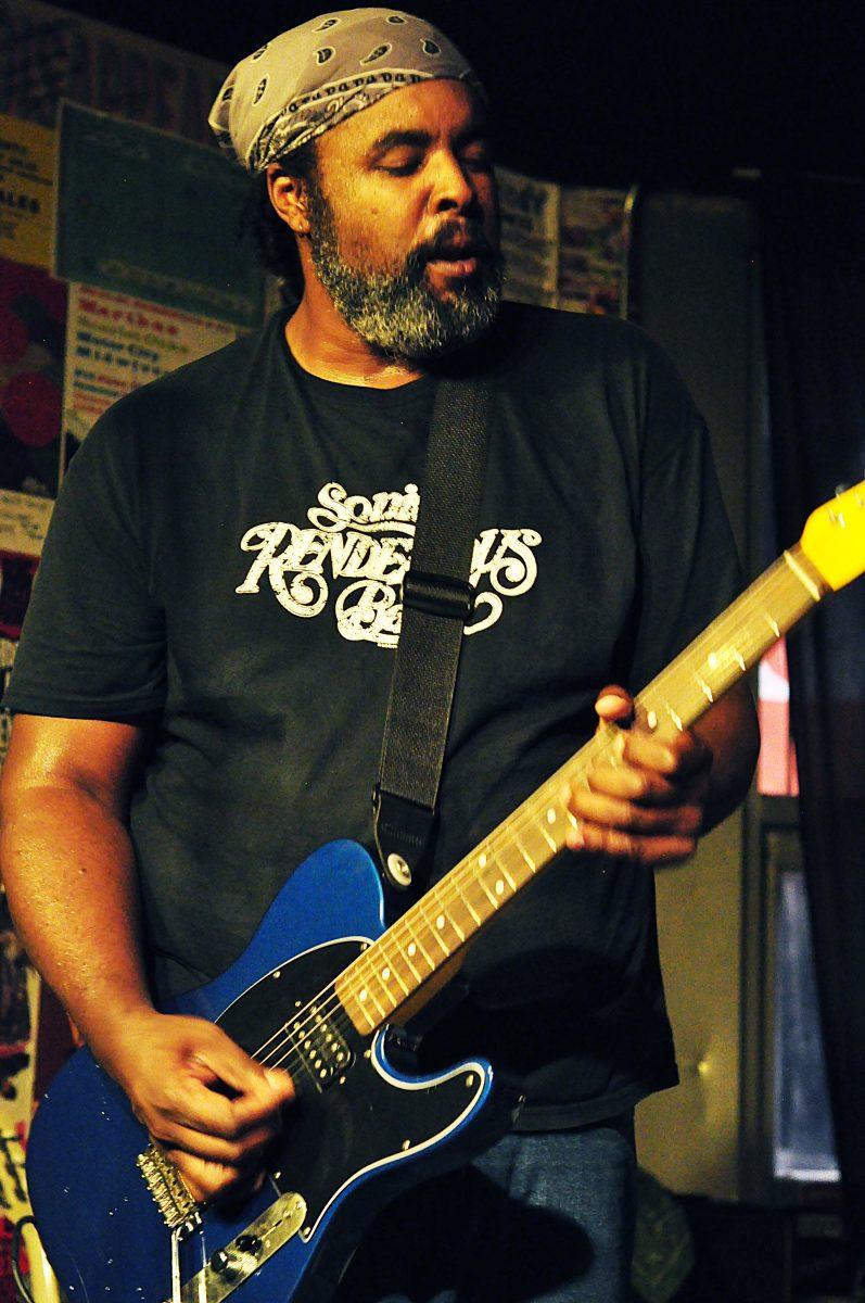 Alvin Youngblood Hart plays electric guitar with his band Alvin Youngblood Harts Muscle Theory. Hart has played at Daves in the past and said he values his time spent on the stage playing both electric and acoustic guitar. 
