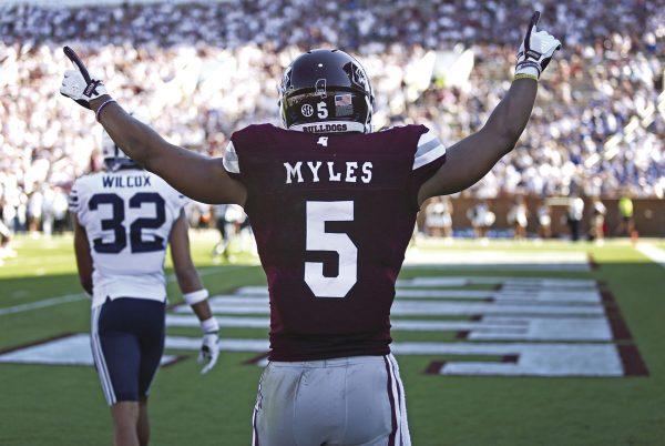 Gabe Myles, senior receiver from Starkville, celebrates as one of his teammates scores a touchdown in MSU’s 35-10 win over BYU.