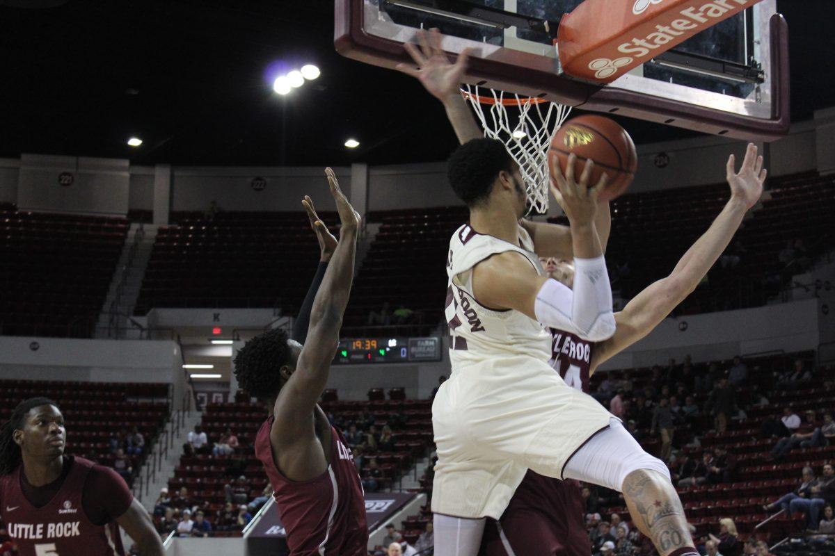 Quinndary Weatherspoon jumps into the air making a baseline pass to his teammate in the corner. MSU beat Little Rock 64-48.