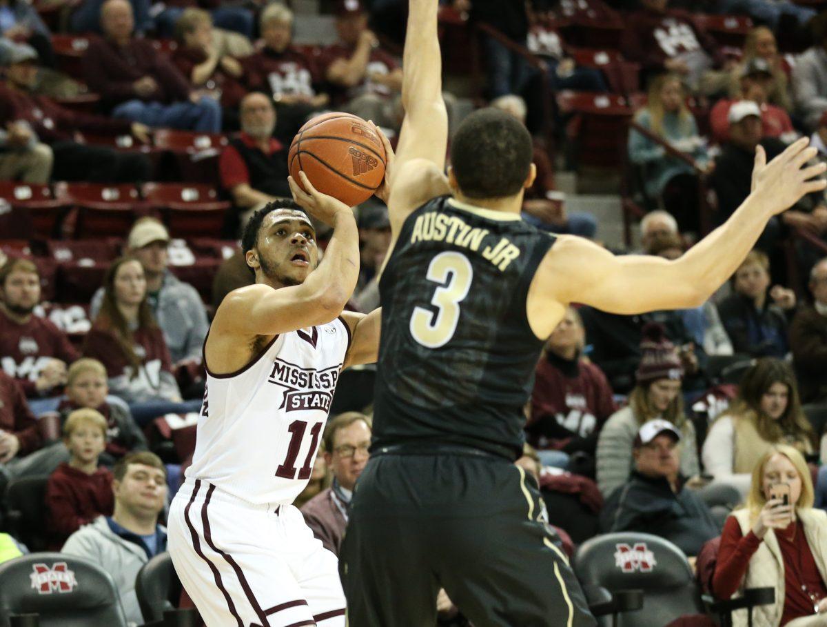 Quinndary+Weatherspoon+shoots+over+a+Vanderbilt+defender.+He+led+the+team+with+19+points.%26%23160%3B
