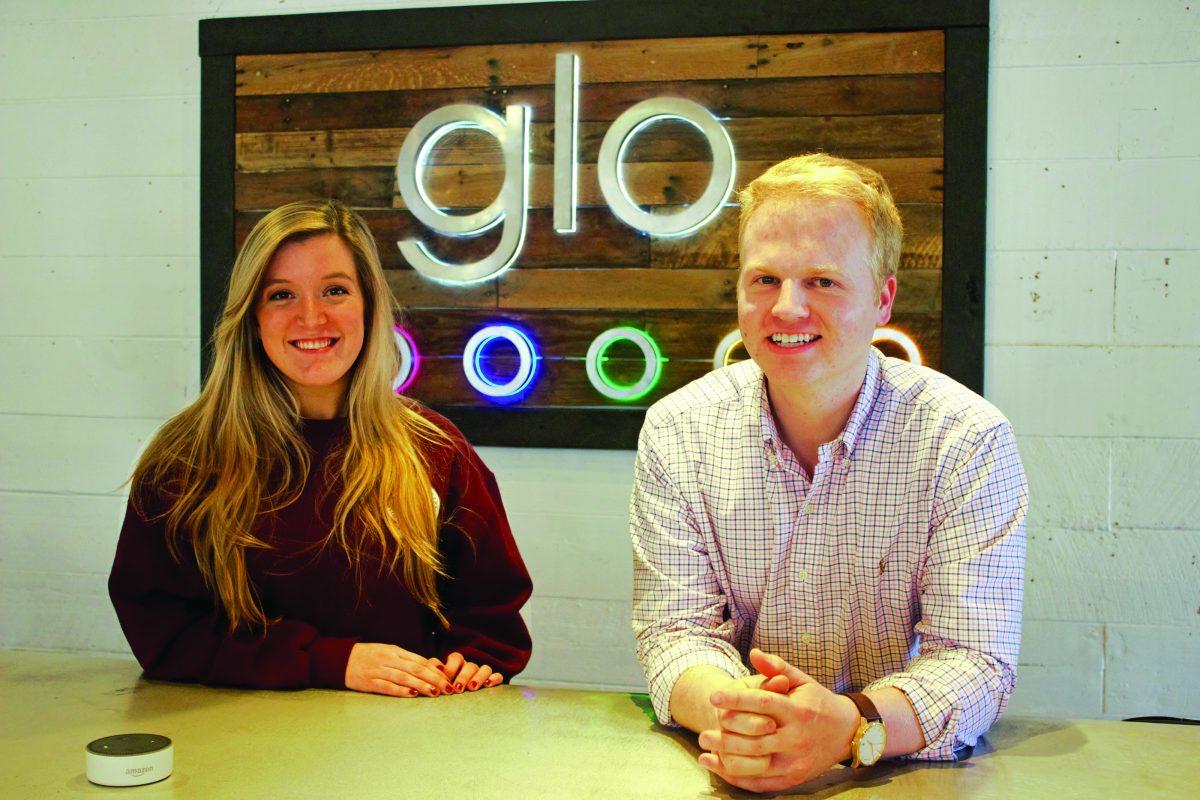 Glo’s Director of Business Development Anna Barker and co-founder Hagan Walker smile in their new business located in downtown Starkville. 