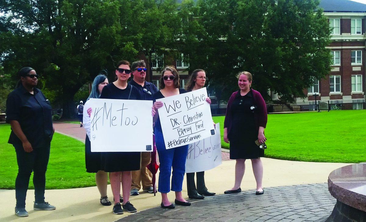 Students, professors show support for assault victims in walk out