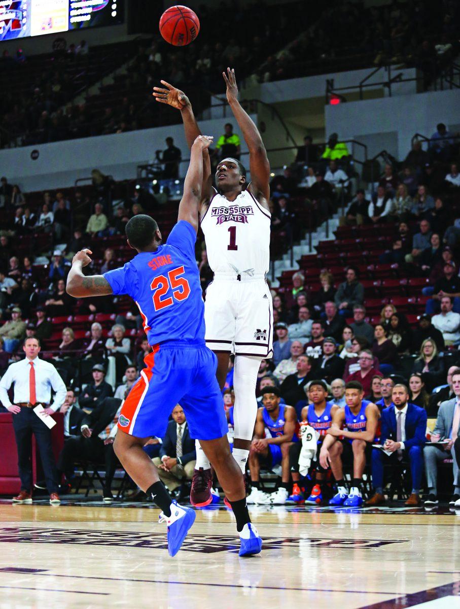 Reggie Perry takes a three point shot against Florida. He made two against Ole Miss on Sunday.