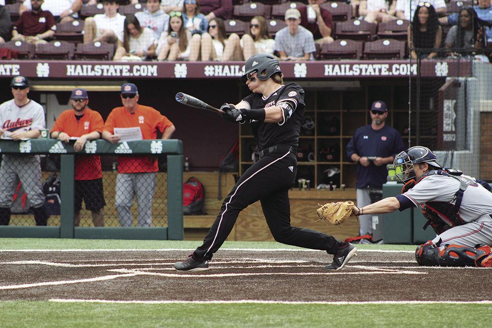 Sophomore Rowdey Jordan gets one of his three hits in MSU’s 20-15 win over Auburn on Sunday.