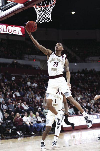 Junior Guard Tyson Carter, who is an Interdisciplinary Studies major, jumps to score at the game against Missouri. Carter scored his highest total of points for the season during this game, where he scored 22 of the Bulldog's 68 points.