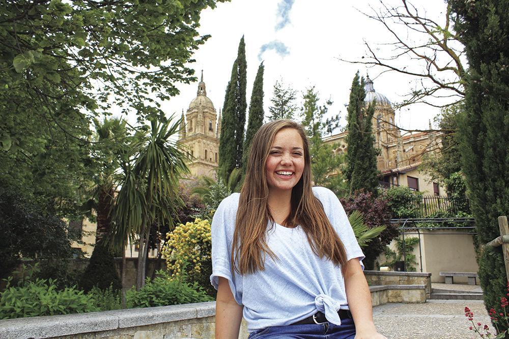 Senior Rachel Nix stands in front of one of the two cathedrals located in Salamanca, Spain during her International Studies Abroad (ISA) trip to during the 2017 spring semester.