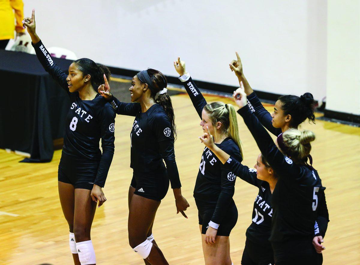 The+MSU+volleyball+team+celebrates.+The+Bulldogs+have+started+the+year+with+six+straight+wins.