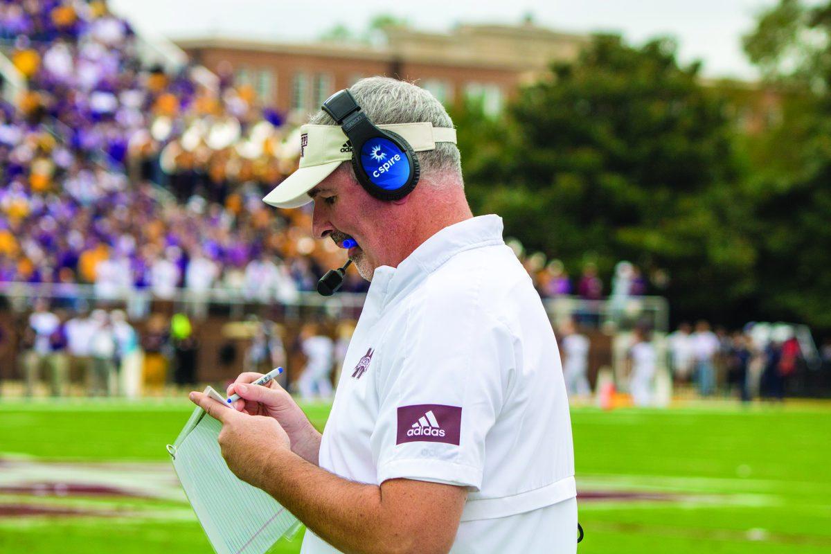 Joe+Moorhead+holds+a+pen+and+call+sheet+during+the+LSU+Game.+Moorhead+has+been+adamant+in+press+conferences+prior+to+and+after+games+about+sticking+with+the+process+in+building+a+program.