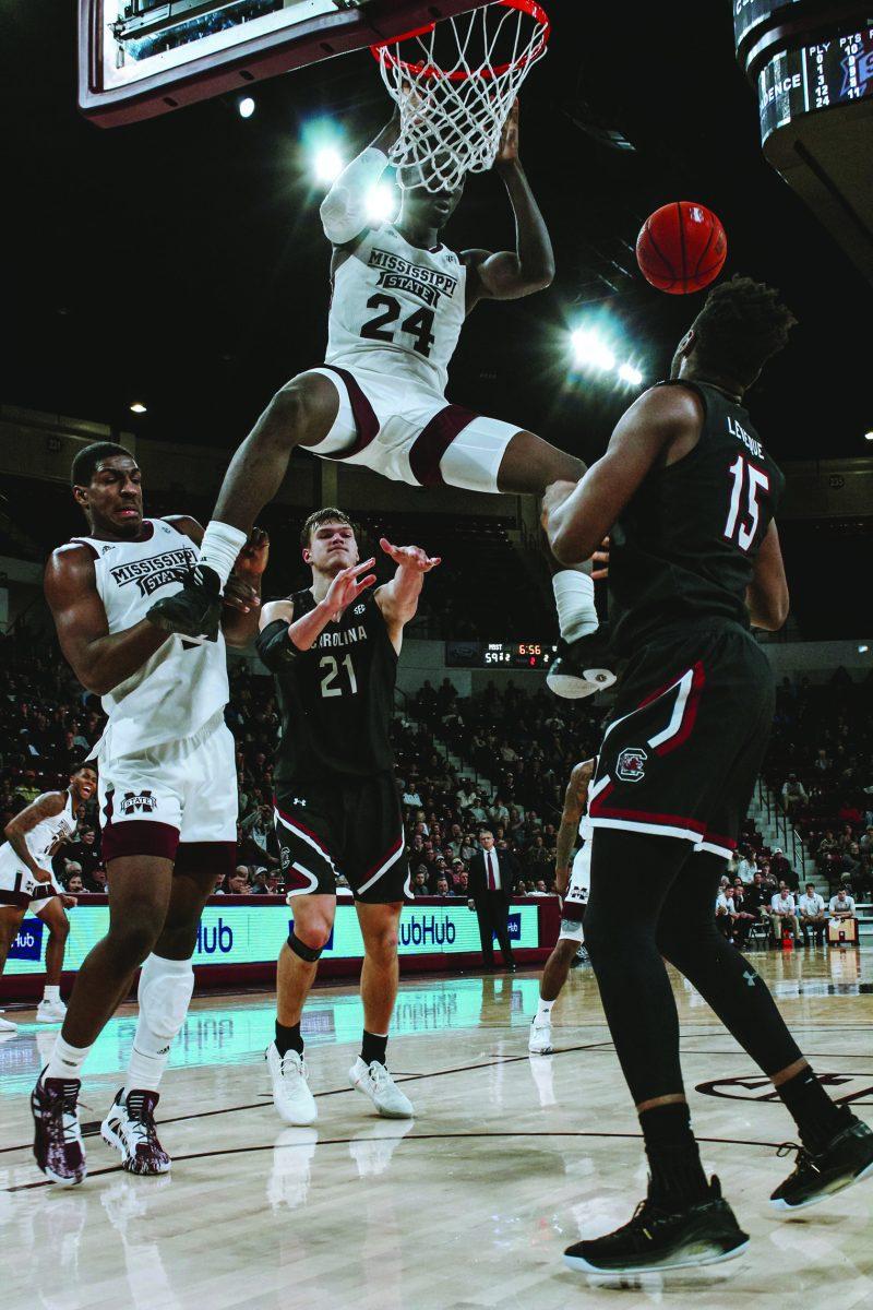 Abdul Ado dunks the ball against South Carolina. Ado had 14 points in the 79-76 win over USC.
