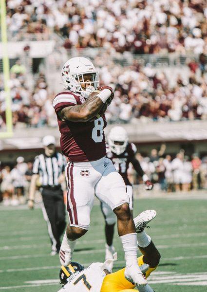 Kylin Hill jumps over an opponent at the Bulldog's home game against Southern Mississippi. The Bulldogs won 38-15. 