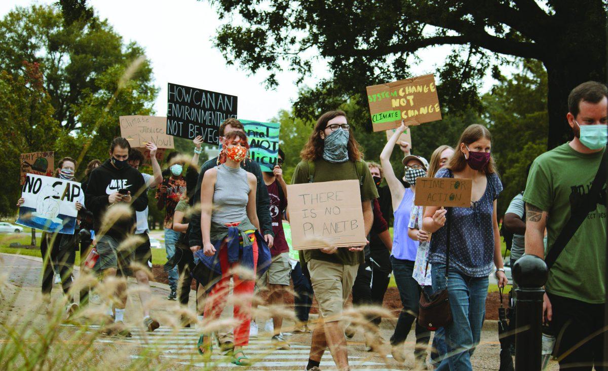 Climate+protestors+march+from+the+MSU+campus+to+downtown+Starkville+on+September+25.+Throughout+the+march%2C+protestors+listened+to+speeches+from+different+campus+and+city+leaders%2C+including+Starkville+Mayor+Lynn+Spruill.
