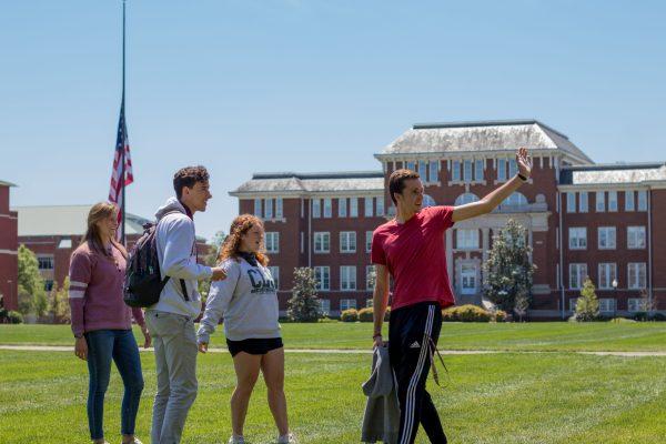 Mississippi State students gather on the drill field. The drill field is an outdoor central meeting area for students and faculty members to enjoy.