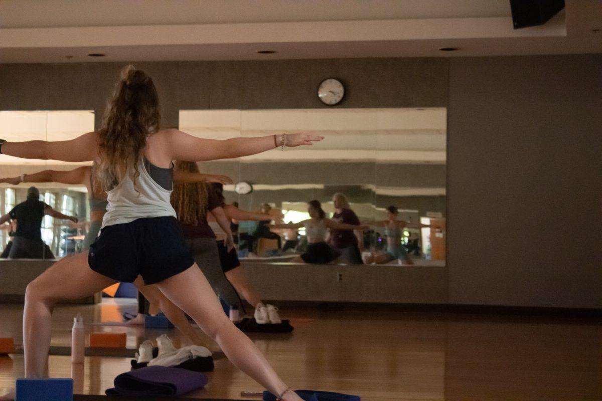 Students participate in a Sunday afternoon yoga class at the Sanderson Center.