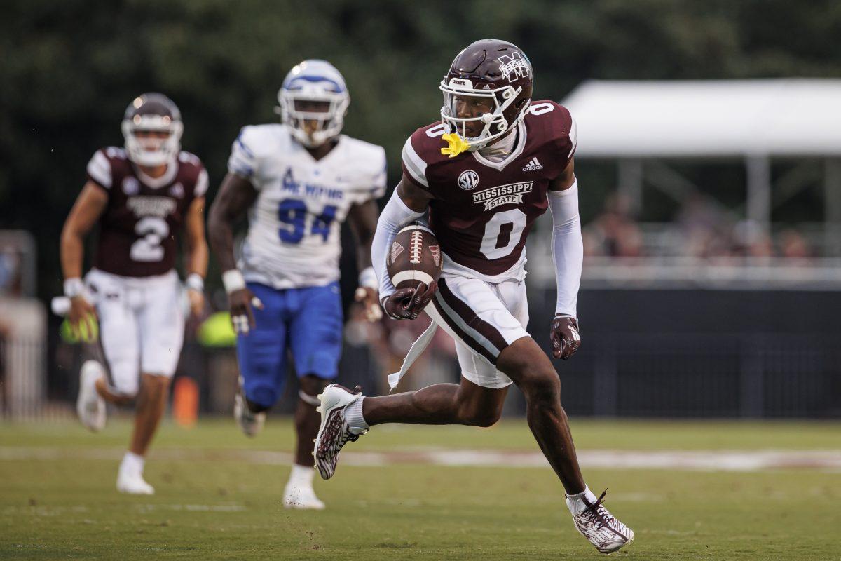 Mississippi State Wide Receiver Rara Thomas protects the ball during the game between the Memphis Tigers and the Mississippi State Bulldogs.