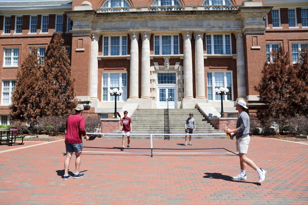 Members of the Mississippi State Pickleball Club played between classes in front of Lee Hall