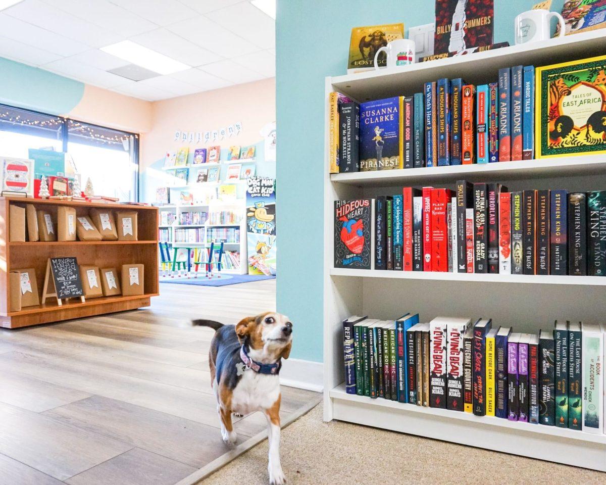 The bookstore dog, Scarlet, has her own book. Customers can get their copy pawtographed.