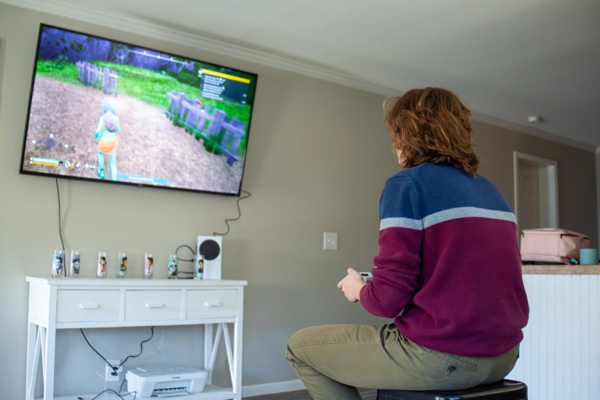 Mississippi State University student Allison Carter tests out Pocket Pairs Palworld on XBox Series S.