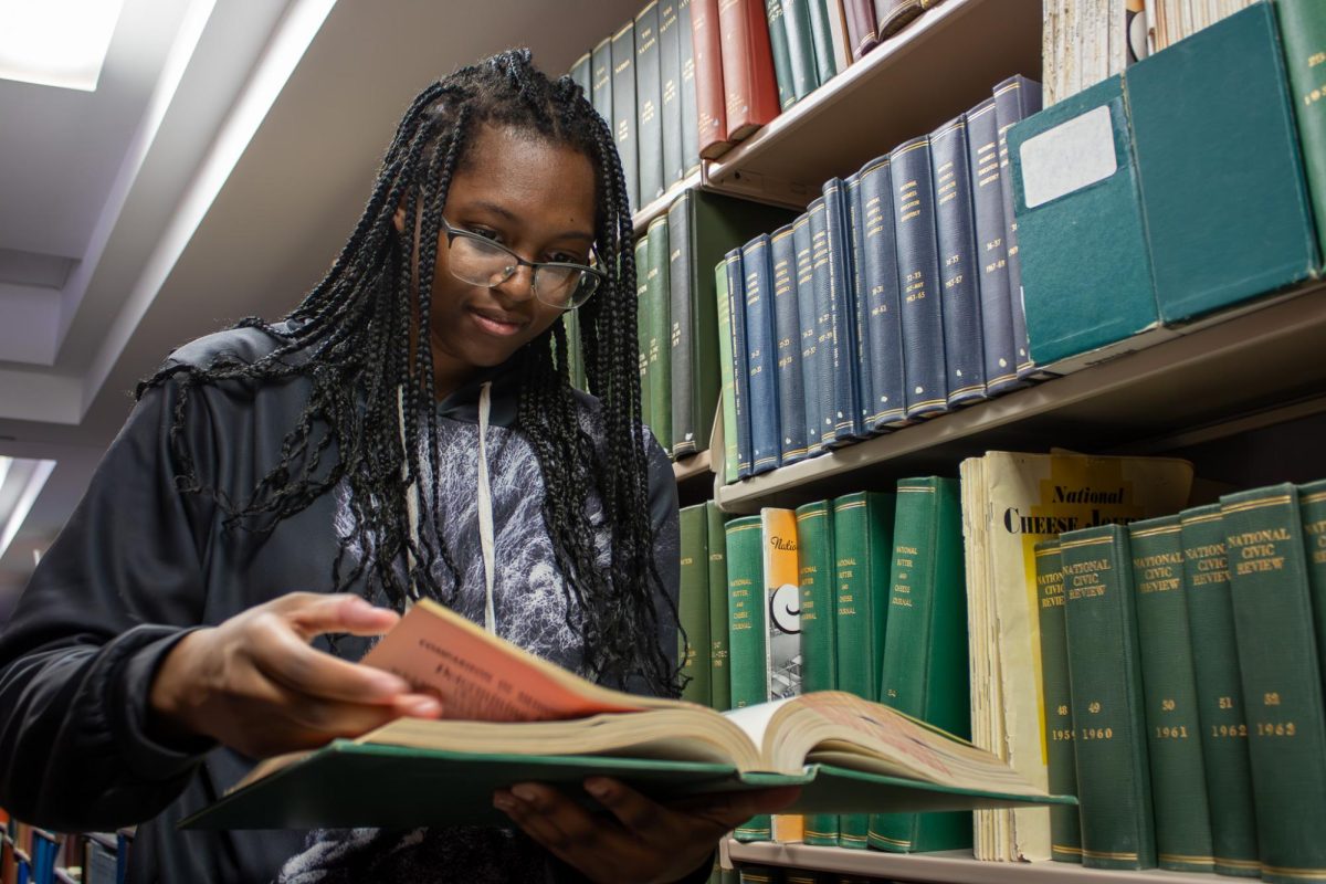Student Jennifer Greer explores the Mitchell Memorial Library.