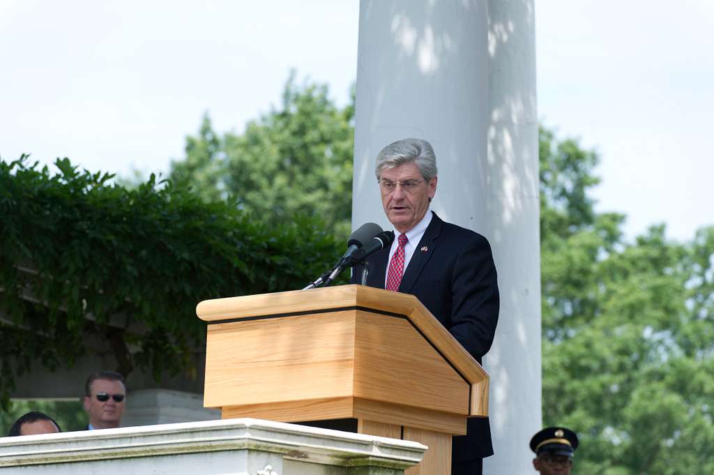 Governor of Mississippi Phil Bryant speaks at a memorial ceremony commemorating the 50th anniversary of the assassination of civil rights activist Medgar Evers held at the Old Memorial Amphitheater in Arlington National Cemetery.