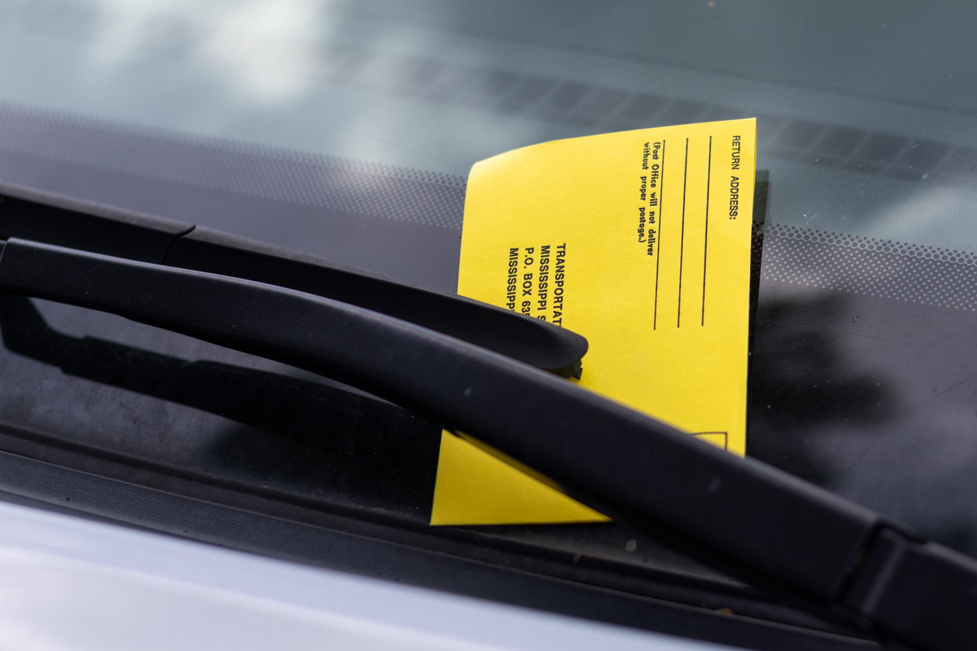 Tickets, iconized by their infamous yellow envelopes, are used to enforce parking rules on campus.