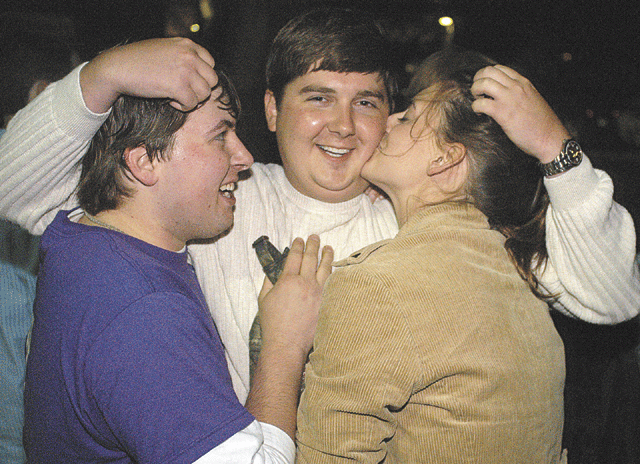 Jeremy England celebrates his victory in the vice presidential race with his campaign workers.
