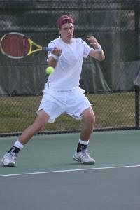 Junior tennis player Christopher Doerr is seen playing tennis during the 2008 spring semester.
