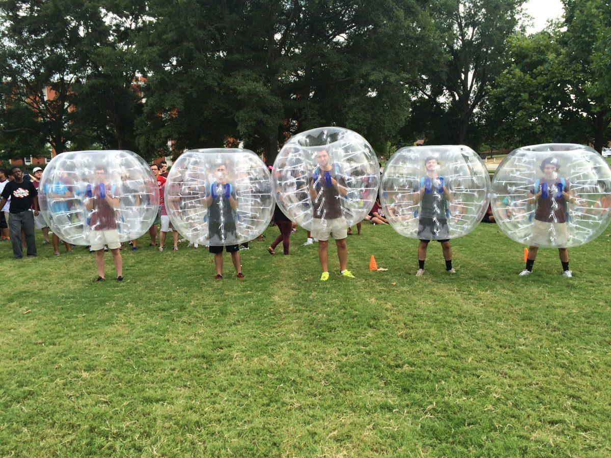 Last Friday, students congregated in The Junction to witness a Bubble Brawl. Students play soccer while dressed in inflatable, clear balls.