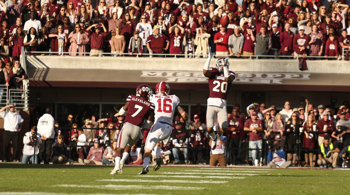 Freshman running back Brandon Bryant, no 20, (pictured) leaps to intercept a Jake Coker pass in the first quarter of the MSU vs. Alabama game last Saturday. The Bulldogs lost the game 30-6 and the bulldogs wide receiver DeRunnya Wilson was injured after tackling an Alabama defensive back who intercepted Prescott.