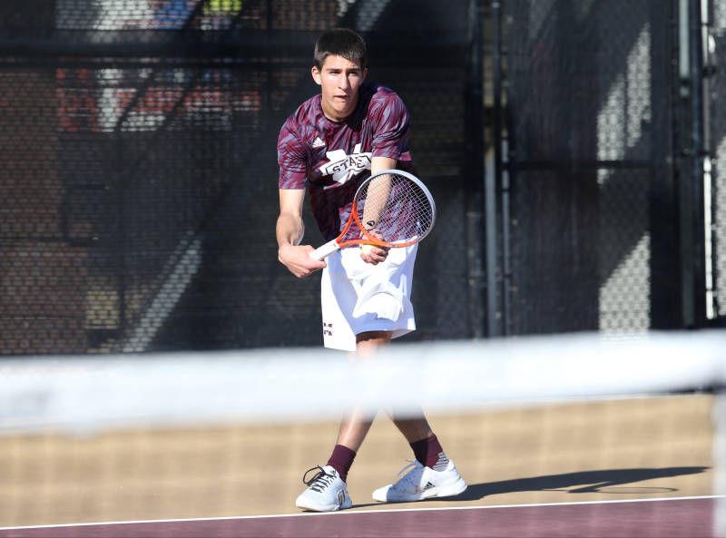 Freshman Strahinja Rakic prepares to serve to his opponent during competition over the weekend. Rakic won two of his three weekend matches in the Bulldogs three-match homestand.