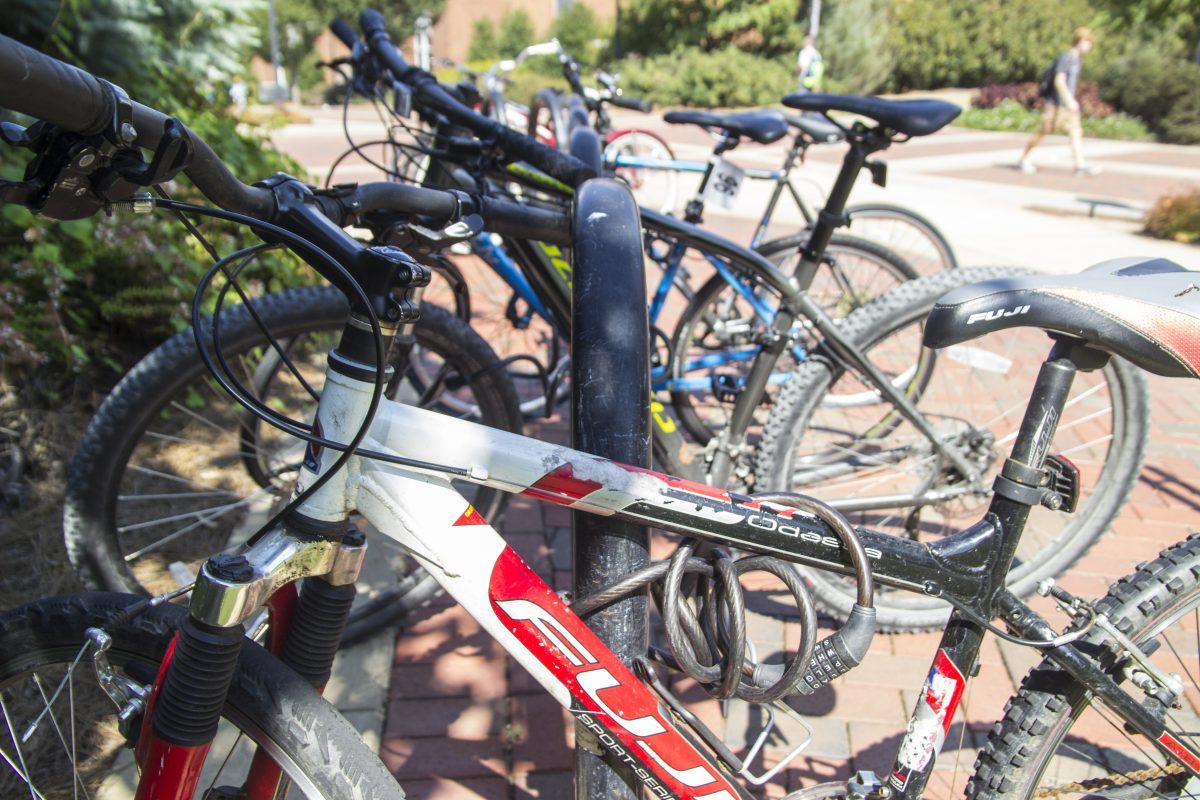 Students+make+use+of+bicycle+racks+outside+the+Perry+Cafeteria.+Racks+are+mandatory%3B+any+bicycles+that+are+not+chained+to+a+rack+may+be+impounded.