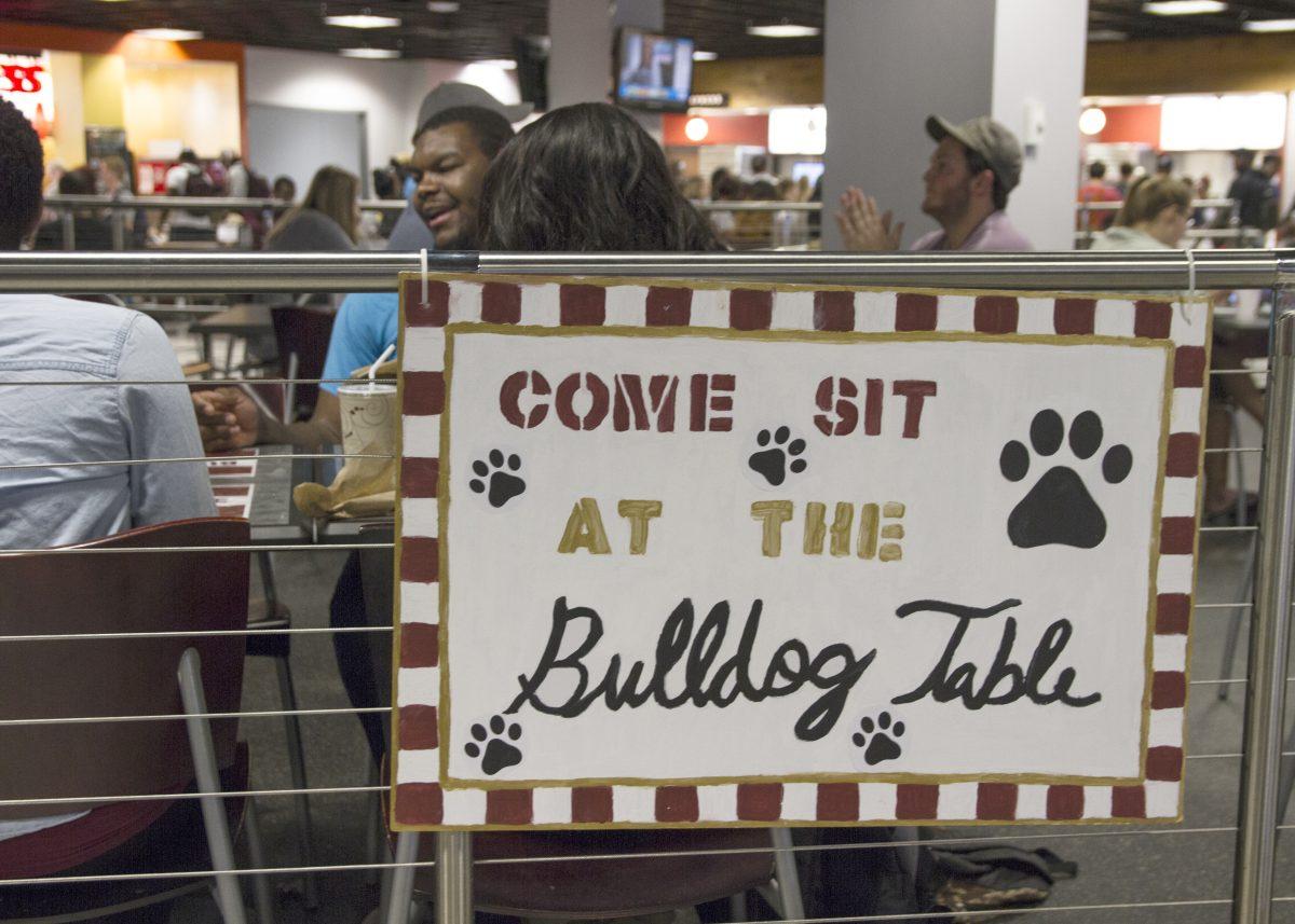 Students+enjoy+eating+lunch+with+new+people+at+the+Bulldog+Table.%26%23160%3B+If+the+Bulldog+Table+is+successful%2C+it+will+be+turned+into+a+permanent+table+for+students+to+freely+eat+at.%26%23160%3B