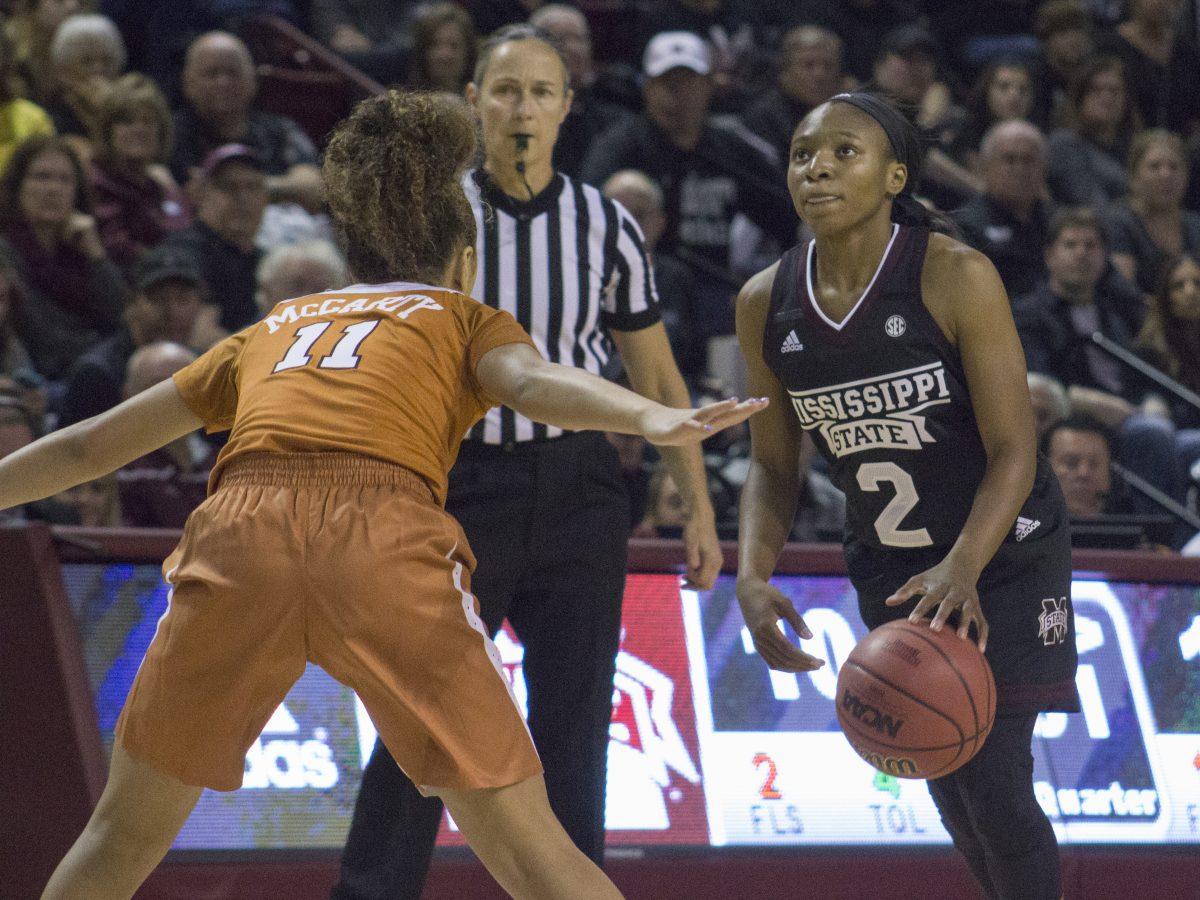 Morgan William dribbles the ball in front of a Texas defender. She led the Bulldogs to a 79-68 win with 23 points. MSU is 4-0. 