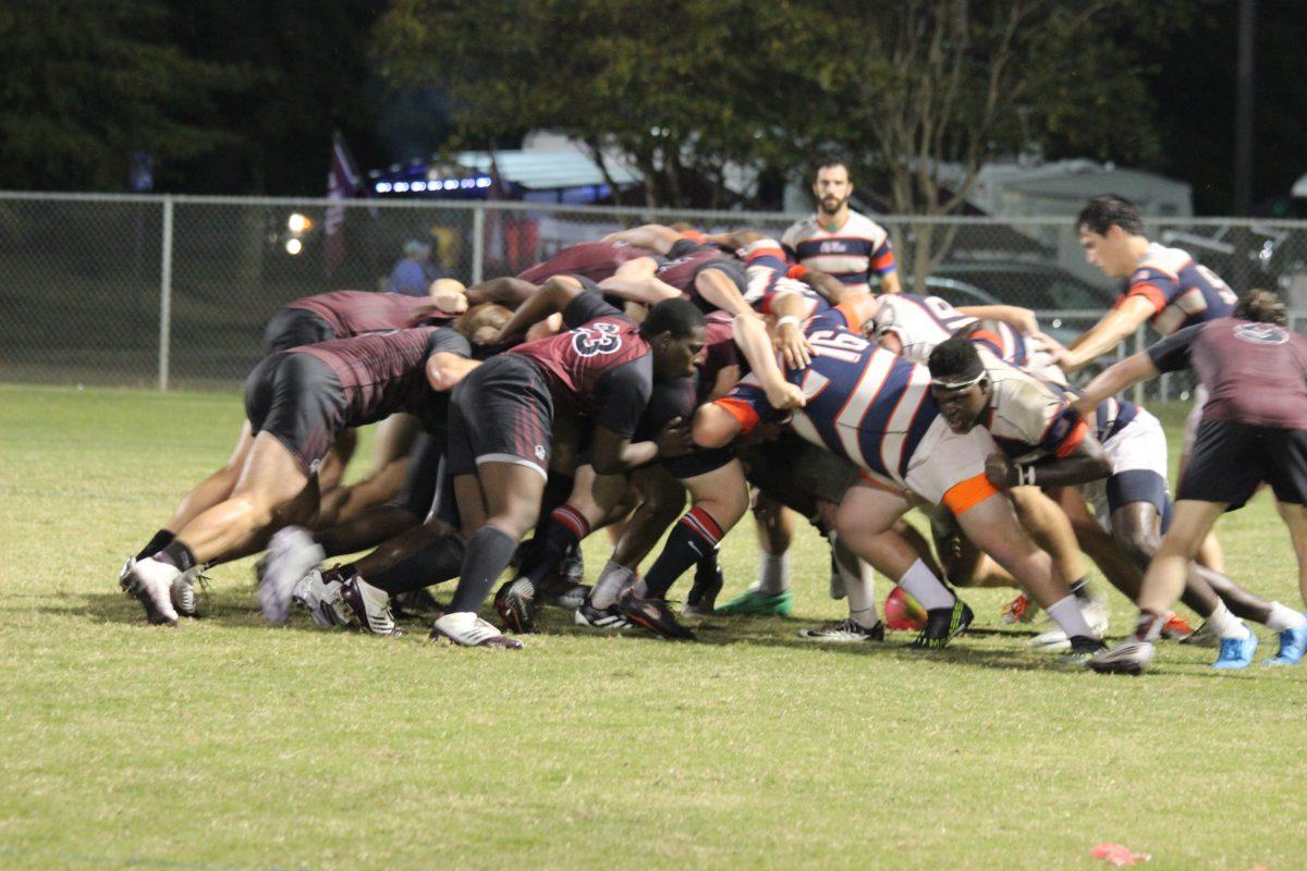 Maddawgs+enter+a+scrum+after+a+penalty+when+the+ball+fell+forward.+They+beat+the+University+of+Mississippi+36-13+on+Friday+night.
