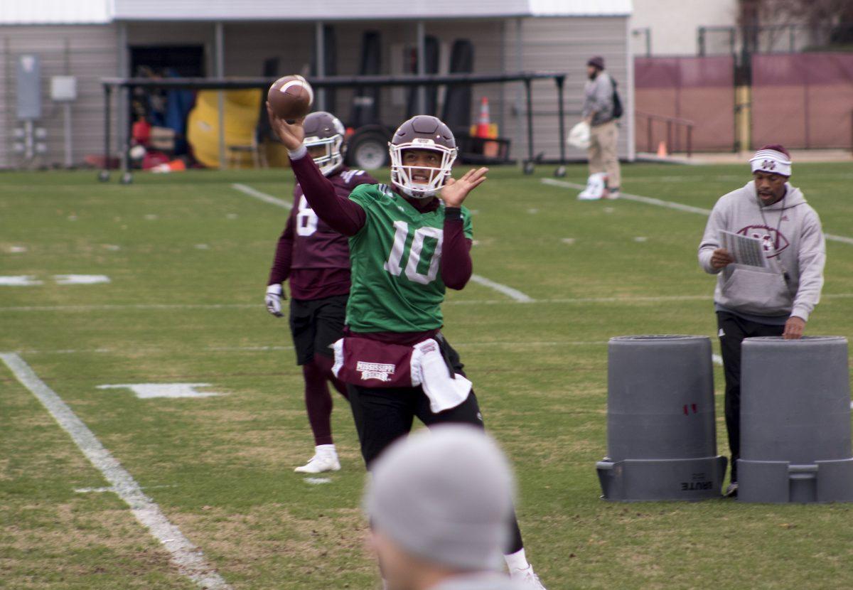 True freshman quarterback Keytaon Thompson will start in a football game for the first time in his career in the TaxSlayer Bowl, where the team will play against the University of Louisville. He goes through drills in their first practice of the season. 