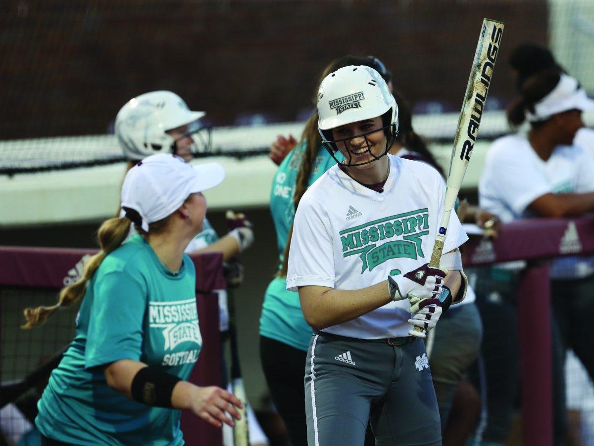 MSU softball wore teal as part of their “No One Fights Alone” campaign in honor of MSU freshman outfielder Alex Wilcox. Wilcox had ovarian cancer in high school. Wilcox smiles while on deck before going into her at-bat in MSU’s 3-0 against UT-Martin on Thursday.