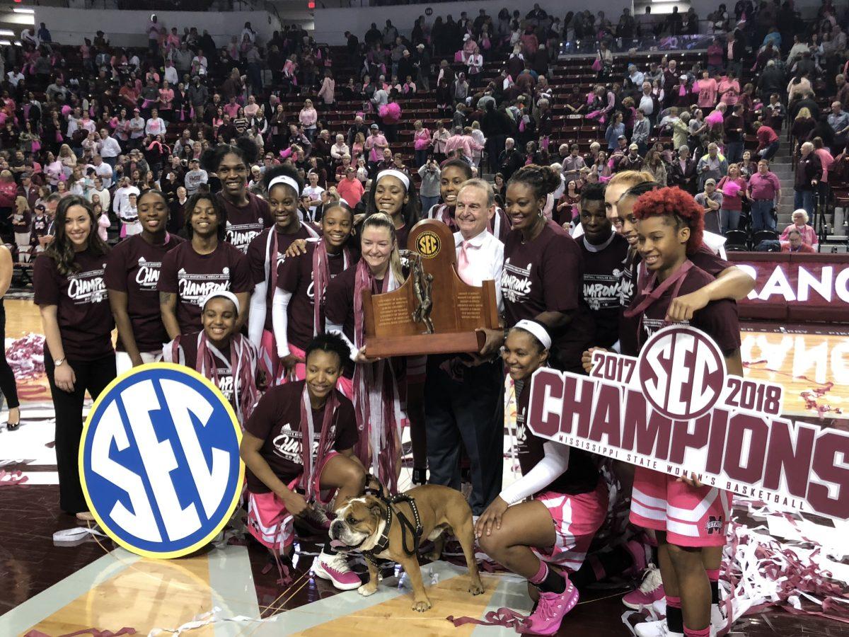 The 2018 No. 2 Mississippi State University womens basketball team poses with their new trophy after their 76-55 victory over No. 17 Texas A&M University. The win gives the Bulldogs the outright Regular Season SEC Title, the first for any womens team in MSU history.