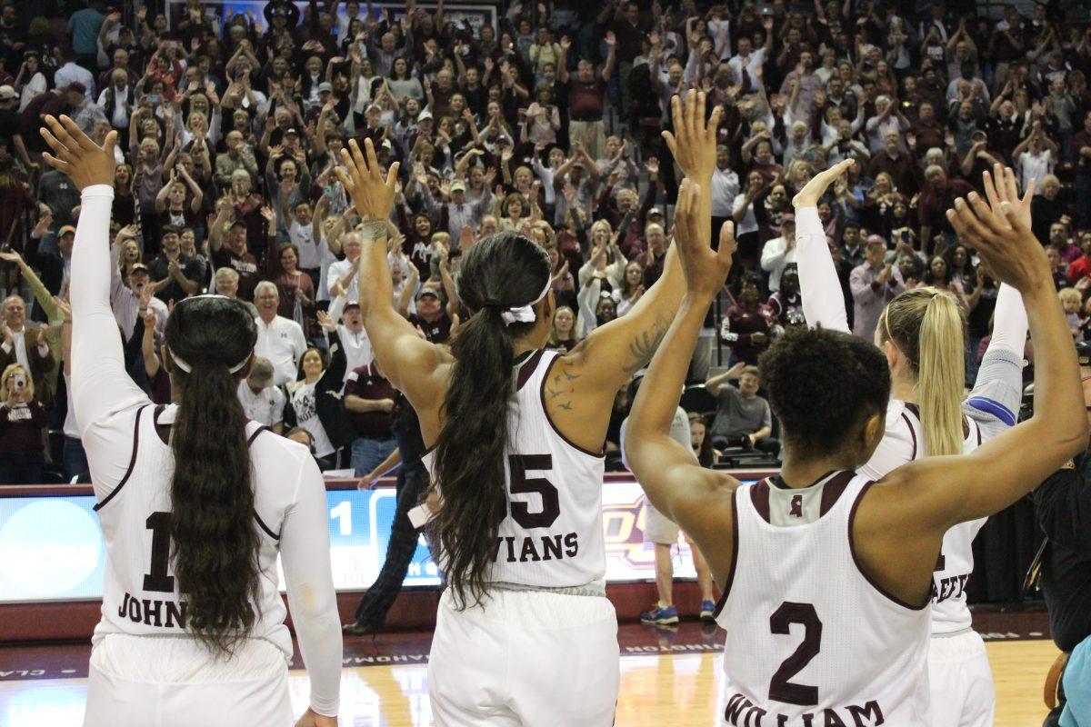 MSUs four seniors wave to the crowd after their second round win over Oklahoma State.