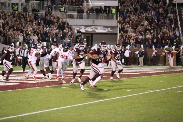 Thompson escapes his own end zone in the waning minutes of the 2017 Egg Bowl.