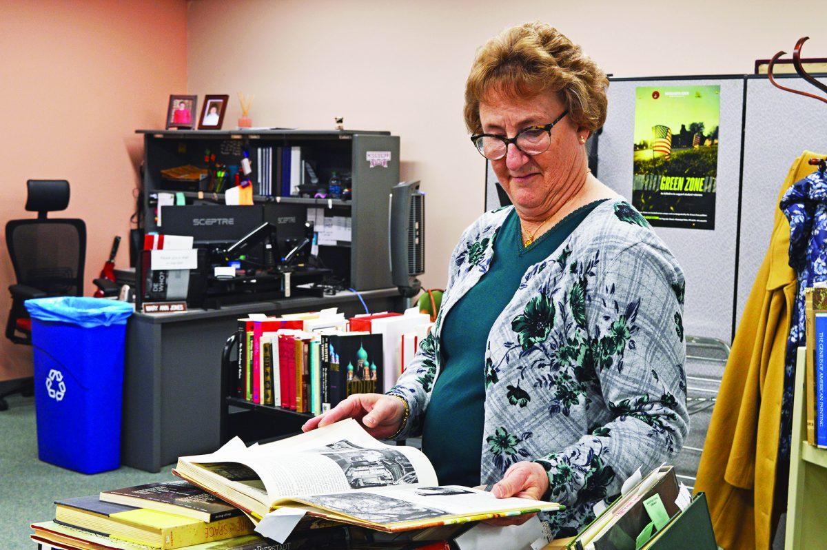 Librarian+Marty+Coleman+glances+through+a+book+in+her+office.+Coleman+served+Mississippi+State+as+a+librarian+for+five+years%3B+however%2C+she+has+worked+in+libraries+for+over+20+years+as+well+as+serving+in+our+military.%26%23160%3B