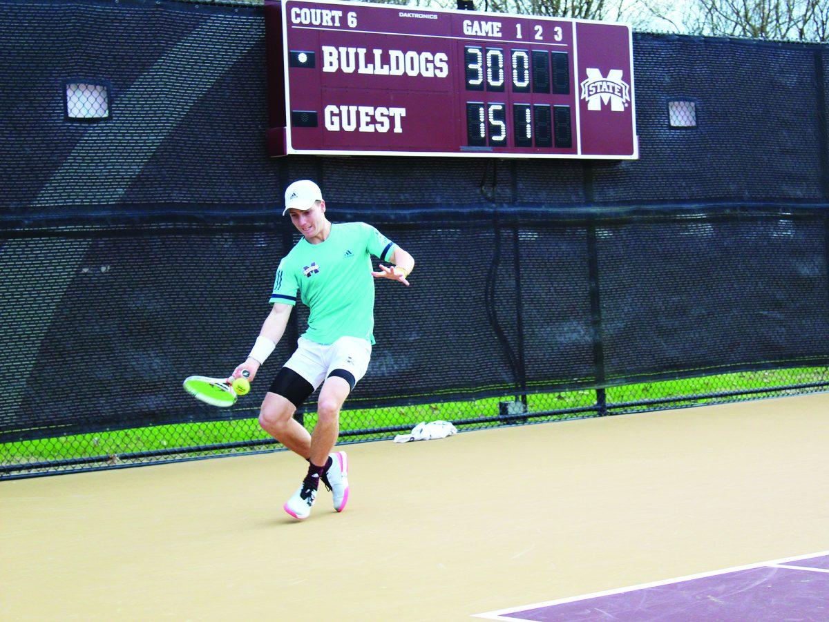 Florian Broska hits the ball in a singles match against Wichita State University. MSU is headed to the national indoor championship for the 12th time in program history. 