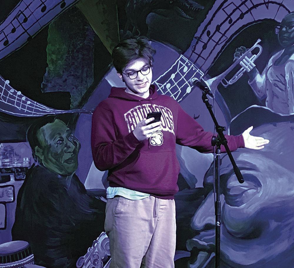 James+Karlson%2C+MSU+freshman+and+art-undeclared+major%2C+performs+his+orginal+poetry+at+The+Streetcar%26%238217%3Bs+first+open+mic+night+of+the+semester+on+Feb.+18+in+the+Colvard+Student+Union%26%238217%3Bs+DawgHouse.