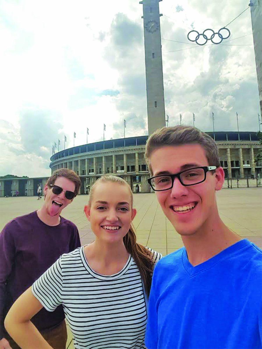 Left to right: Nathan Smith, Dani Schulze and Ethan Worch stand in front of Olympic Stadium in Berlin in the summer of 2017.