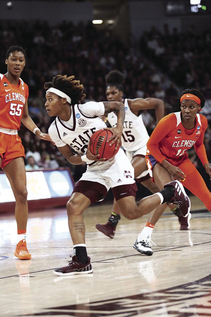 Senior Guard Jordan Danberry slips past Clemson defenders at the second round NCAA tournament game against the Clemson Tigers on March 24. Danberry scored 18 points to help advance Mississippi State to the Sweet Sixteen in Portland, Oregon.