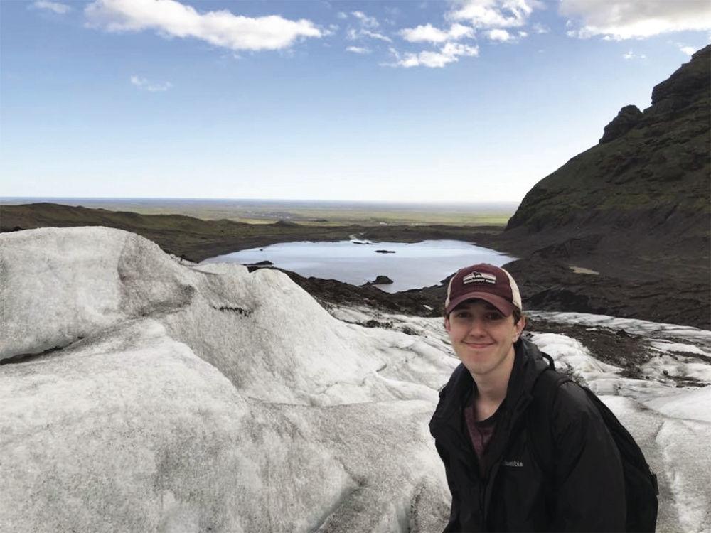Junior Garret Green hikes up a glacier in Iceland in his free time during his study abroad trip in Germany during the summer of 2018.