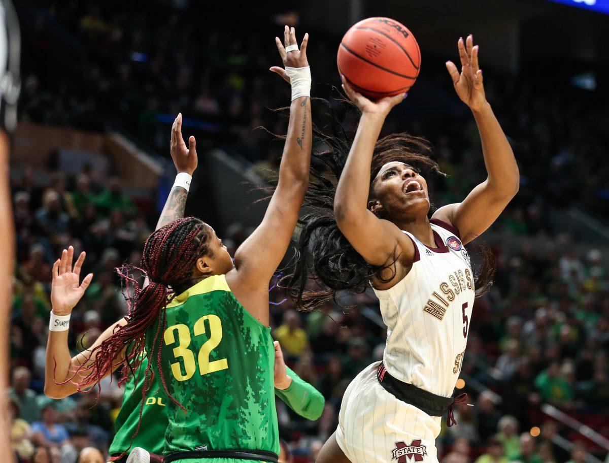Basketball+Anriel+Howard+goes+up+for+a+shot+against+Oregon+on+Sunday.+MSU+lost+to+Oregon+in+the+Elite+Eight+round+of+the+NCAA+tournament+88-84.