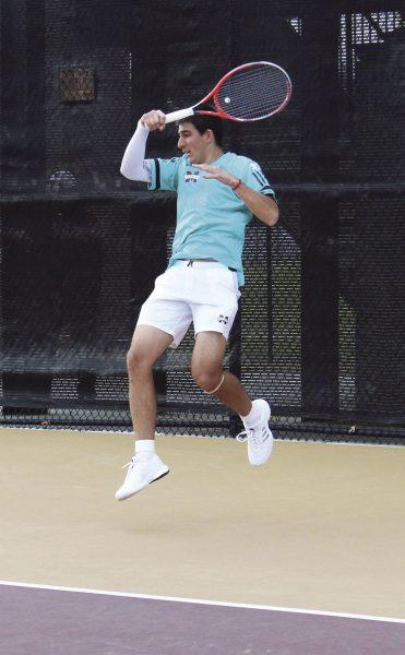 Strahjnia Rakic hits a volley in a match for MSU. Rakic and Nuno Borges are ranked number one in mens doubles nationally according to the Intercollegiate Tennis Association website.