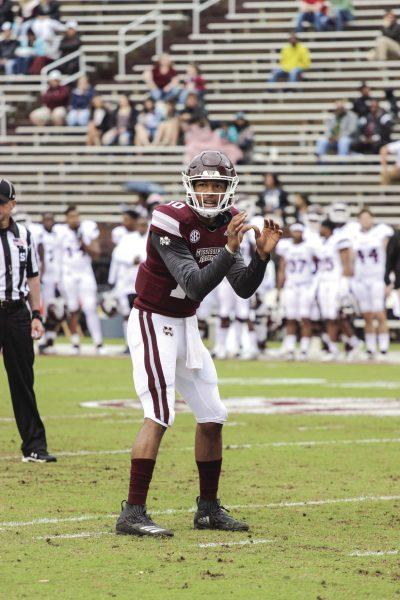 Keytaon Thompson looks over to the side line before snapping the ball.