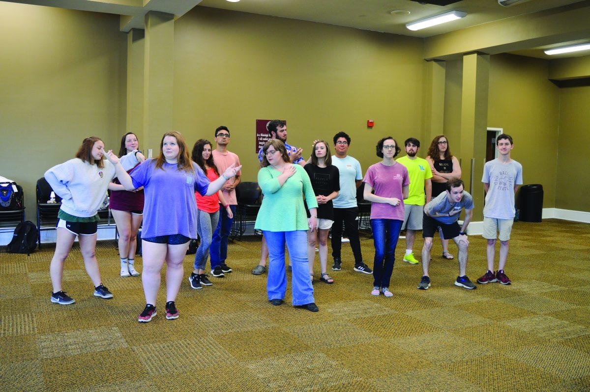 Student members of the Shackouls Honors College enjoy practicing in the Griffis Hall Forum Room for their nearing production which is on April 17